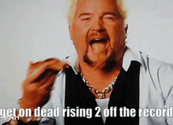 Guy Fieri Eating Pizza While Laughing GIF
