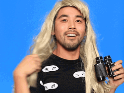 Guy Flipping Hair And Looking GIF