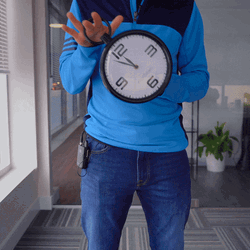Guy Holding Clock Countdown GIF