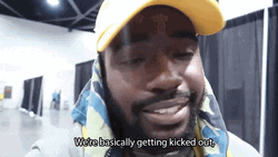 Guy In Yellow Hat Kicked Out In Nice Way GIF