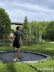Guy Jumping On A Trampoline GIF