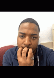 Guy Looking Around Nail Biting GIF