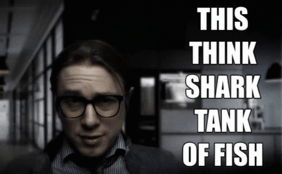 Guy Mouthing Shark Tank Of Fish GIF