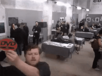 Guy Moving Around The Dvd GIF