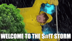 Guy On Raincoat DuringThunderstorm GIF