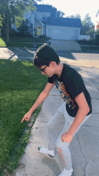 Guy Pointing The Grass GIF