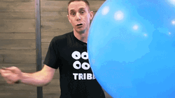 Guy Popping Balloon