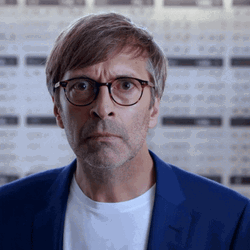 Guy Removing Eyeglasses And Looking GIF
