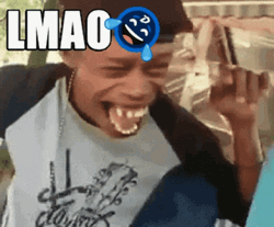 Guy Rolling On The Floor Laughing So Hard GIF