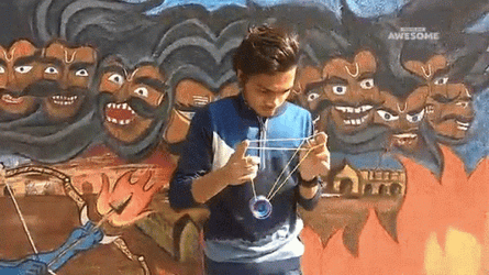Guy Showcasing Yo Yo Techniques GIF