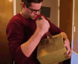Guy Stabbing A Small Box GIF