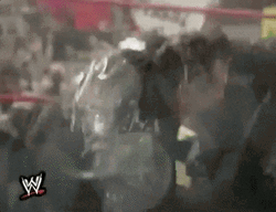 Guy Trying Escape Splash Water Using Fire Hose GIF