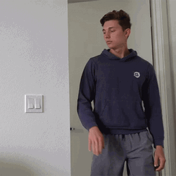 Guy Turning On Switch GIF