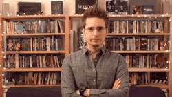 Guy Waiting In The Library GIF