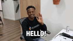 Guy Waiving Adele Hello While Sitting GIF