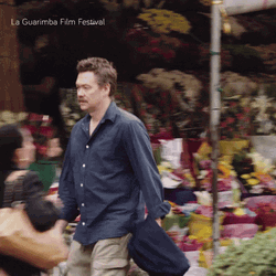 Guy Walking Fast To Explore City GIF