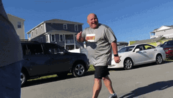 Guy Walking With A Thumbs Up GIF