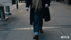 Guy Wearing A Long Coat Walking GIF