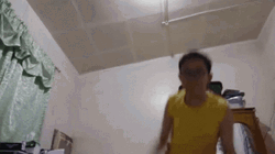 Guy Wearing Yellow Shirt Punch GIF