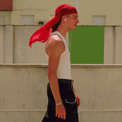 Guy With Red Bandana Walking GIF