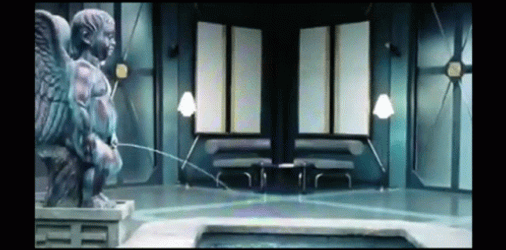 Guys Hides In The Statue And Pee GIF