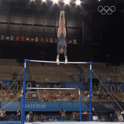 Gymnast Doing Handstand On Parallel Bars GIF