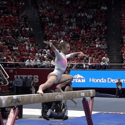 Gymnast On Balance Beam With Honda Banner GIF
