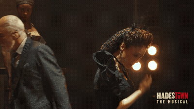 Hadestown Musical Poster Man And Woman Dancing GIF