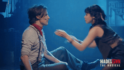 Hadestown Musical Poster Man And Woman GIF