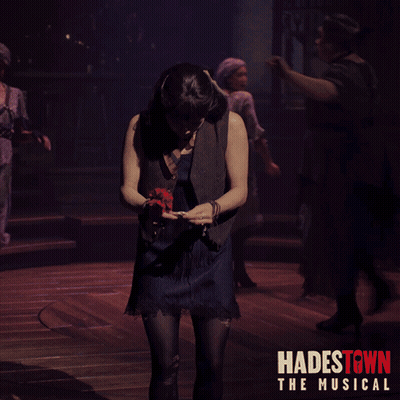 Hadestown Poster Woman Holding Microphone GIF
