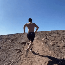 Half Naked Running Man Climbing Uphill GIF