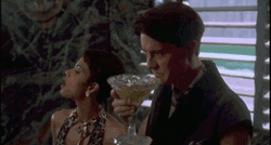 Halle Berry Blowing Smoke GIF