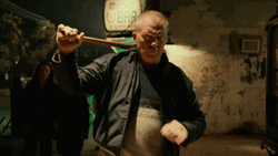 Halloween Kills Anthony Michael Hall Wielding Bat GIF