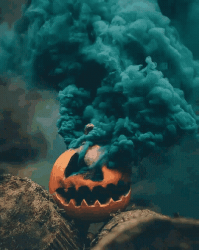 Halloween Pumpkin With Smoke Coming Out Of Mouth GIF