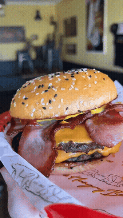 Hamburger With Bacon And Cheese On McDonald's Paper GIF