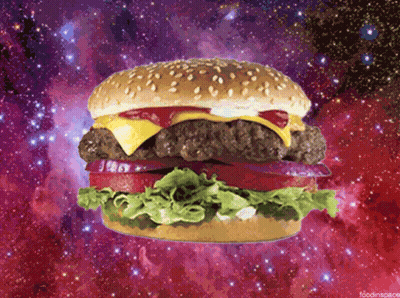 Hamburger With Cheese Lettuce Tomato And Ketchup On Galaxy Background GIF