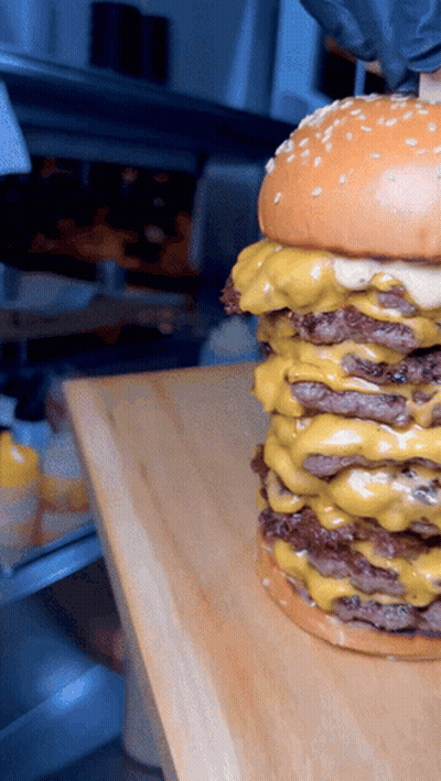 Hamburger With Three Cheese Layers GIF