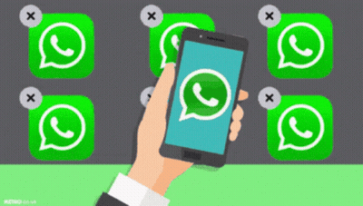 Hand Holding Cell Phone With WhatsApp Icon GIF