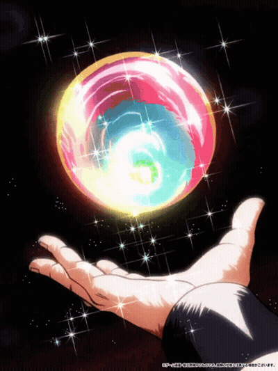 Hand Holding Colorful Sphere With Chinese Writing GIF