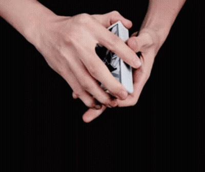 Hand Holding Fan Of Playing Cards GIF