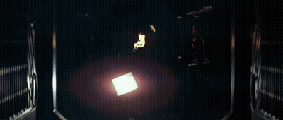 Hand Holding Fireball In Dark GIF