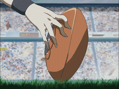 Hand Holding Football On Field GIF