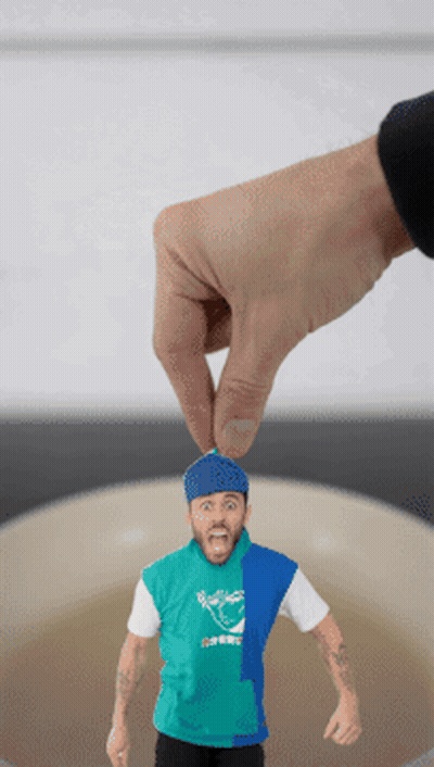 Hand Holding Man With Rockets Shirt GIF