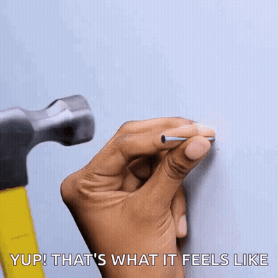 Hand Holding Nail In Front Of Hammer Saying Yup That's What It Feels Like GIF