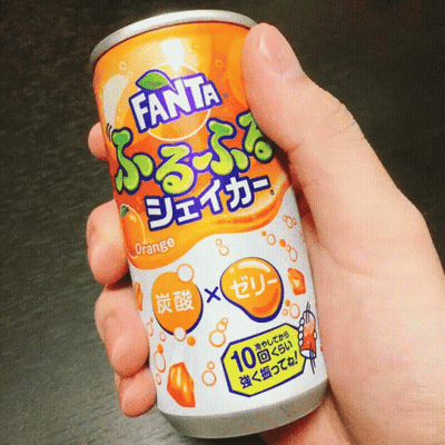 Hand Holding Orange Fanta Can GIF