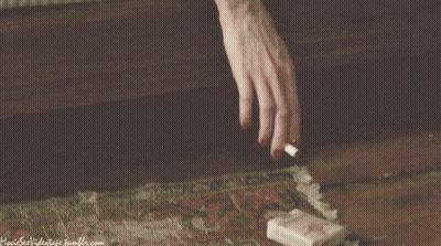 Hand Holding Paper With Website GIF