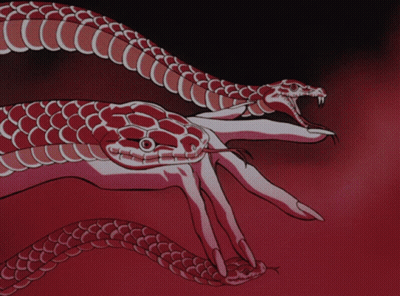 Hand Holding Snake With Tongue Out GIF