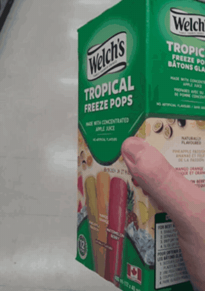 Hand Holding Welch's Tropical Freeze Pops GIF