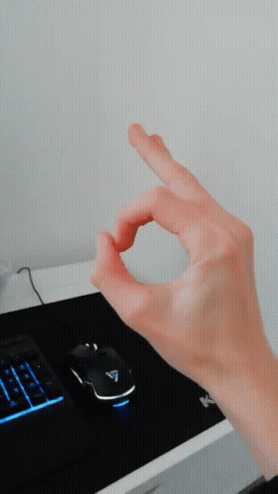 Hand Making OK Sign In Front Of Computer Mouse And Keyboard GIF