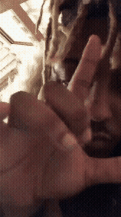 Hand Making Peace Sign